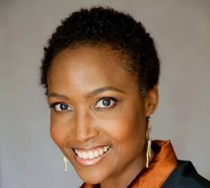Kay Kirkman, career coach and talent leader, in a studio headshot against a soft grey backdrop